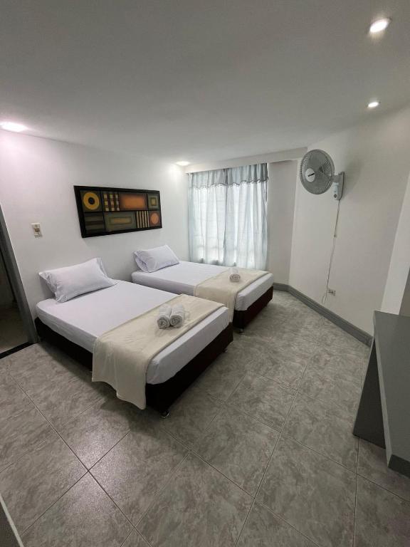 Letto o letti in una camera di Hotel Armenia Lions
