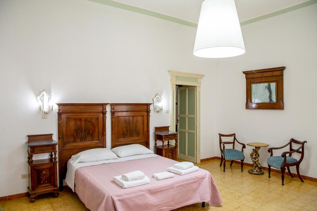 Postel nebo postele na pokoji v ubytování Honoré de Balzac