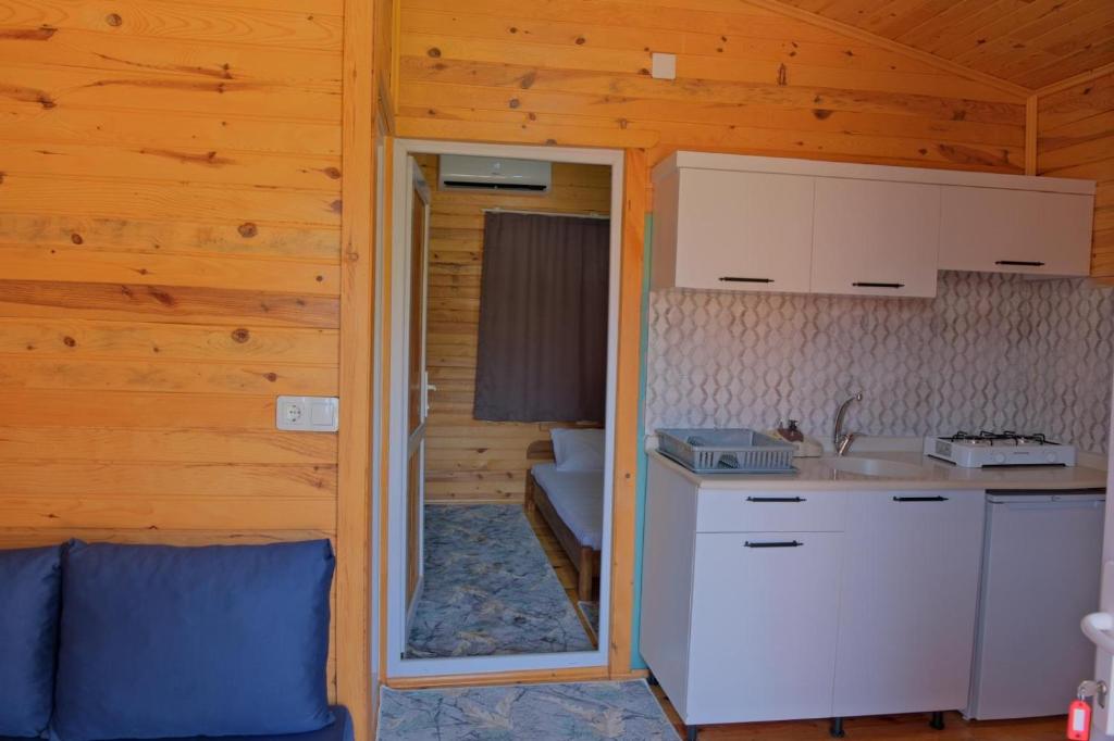 Kuchyň nebo kuchyňský kout v ubytování Venüs Gold Bungalov Adrasan