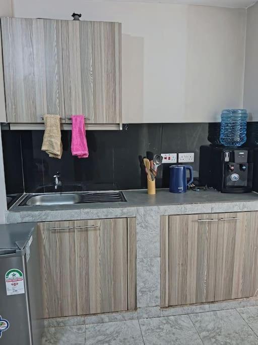Kuchyň nebo kuchyňský kout v ubytování Maya Nest Lounge