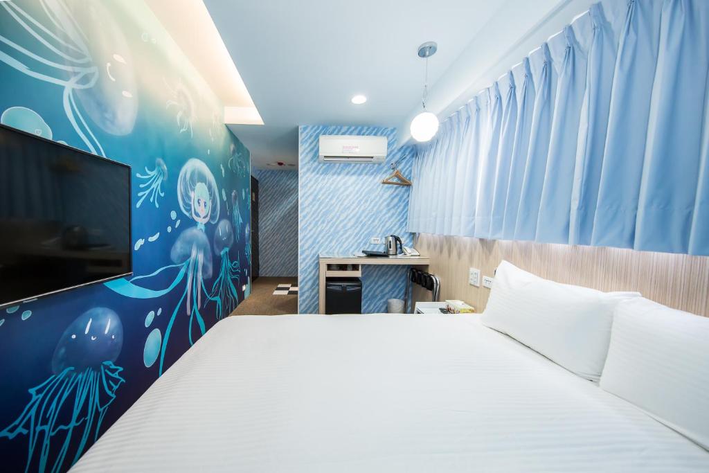 Postel nebo postele na pokoji v ubytování Morwing Hotel - Culture Vogue