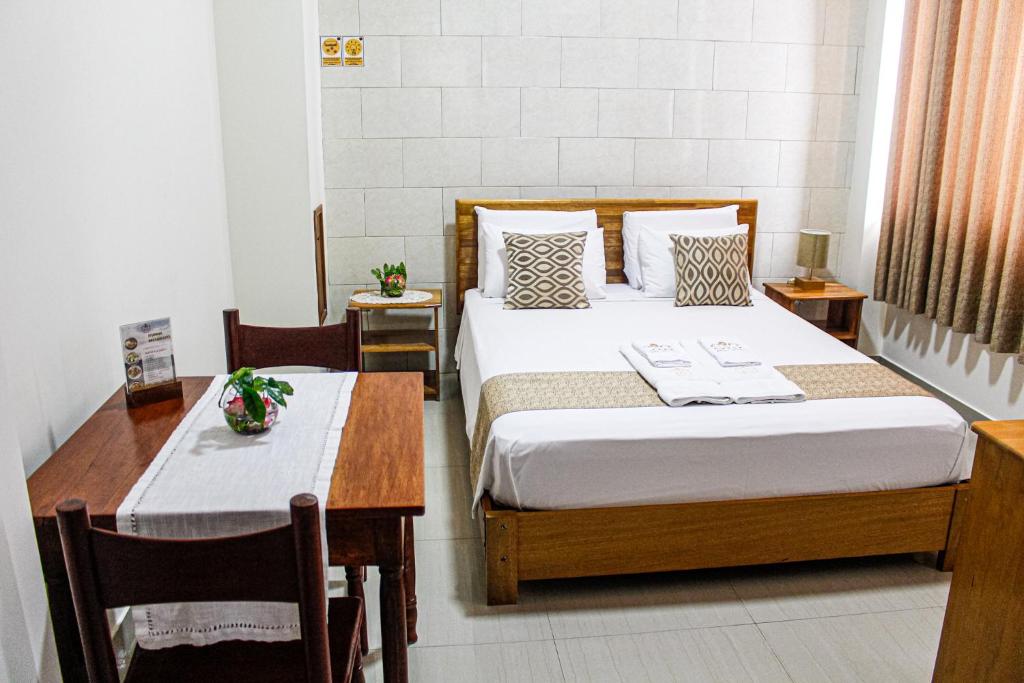 Postel nebo postele na pokoji v ubytování Studio 69 Aparthotel