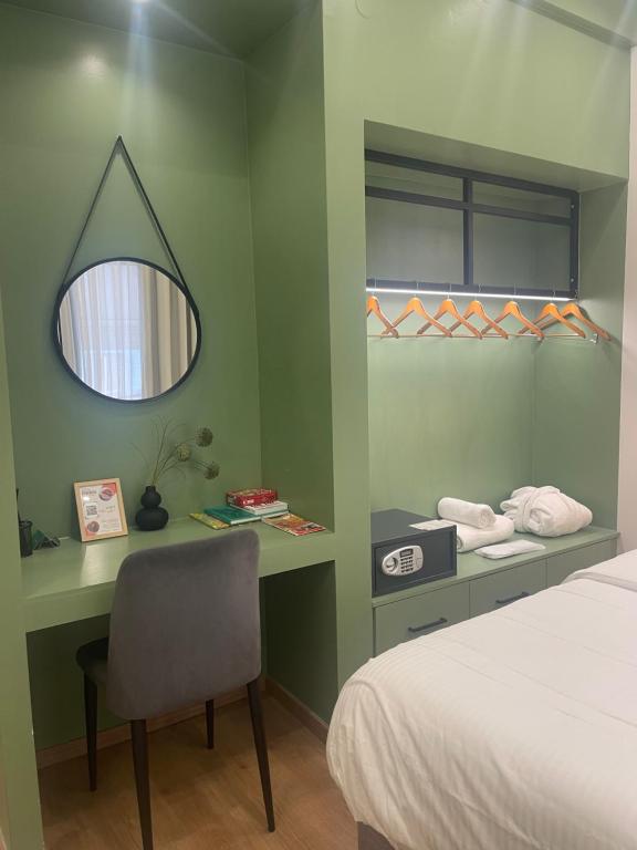 Posteľ alebo postele v izbe v ubytovaní Plane Tree Luxury Suites