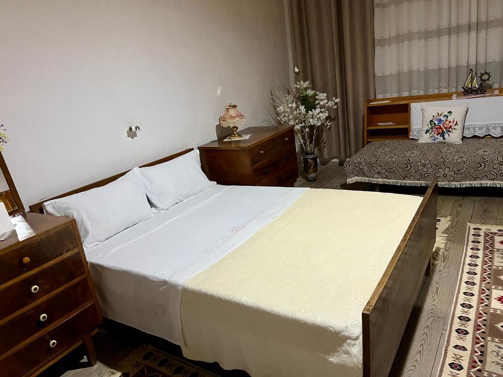 Postel nebo postele na pokoji v ubytování Tourists Guest House