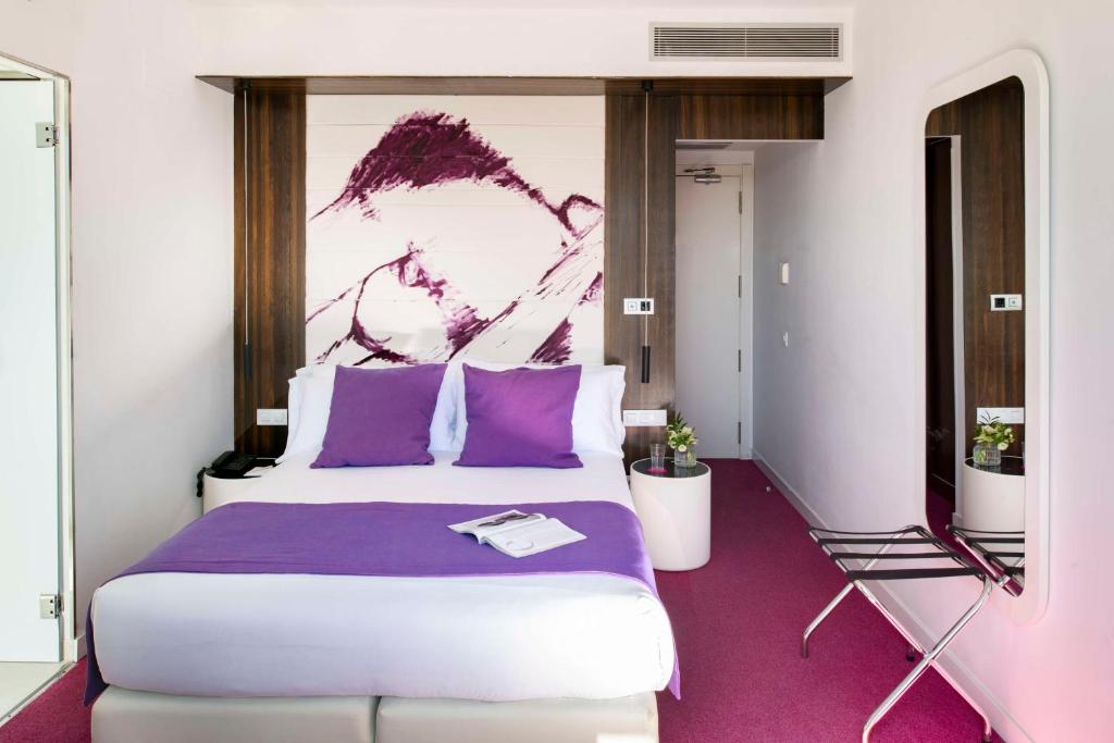 Postel nebo postele na pokoji v ubytování Allegro Barcelona