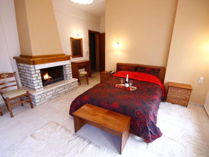 Posteľ alebo postele v izbe v ubytovaní Hotel Ilianna