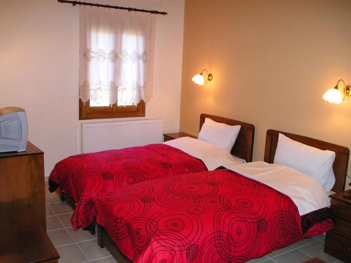Posteľ alebo postele v izbe v ubytovaní Hotel Ilianna