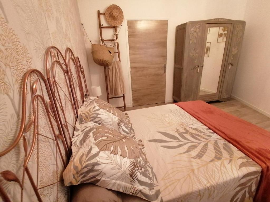 Postel nebo postele na pokoji v ubytování Gîte et chambres d'hôtes Les 2 Pins