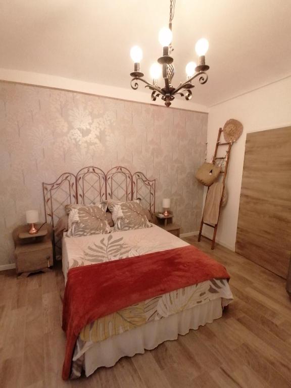 Postel nebo postele na pokoji v ubytování Gîte et chambres d'hôtes Les 2 Pins