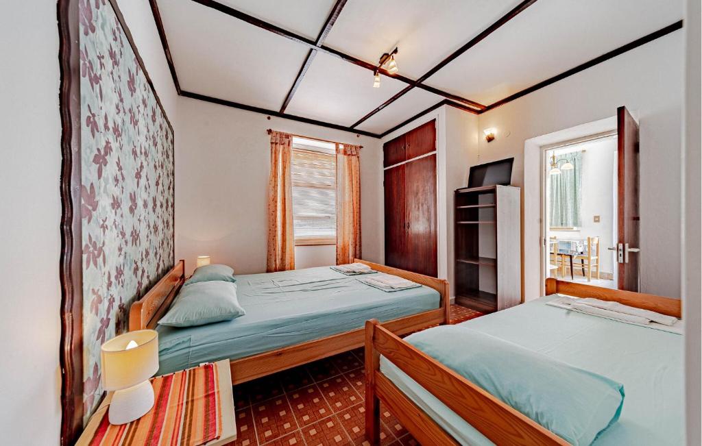 Łóżko lub łóżka w pokoju w obiekcie Apartment Koludrt Bb Croatia