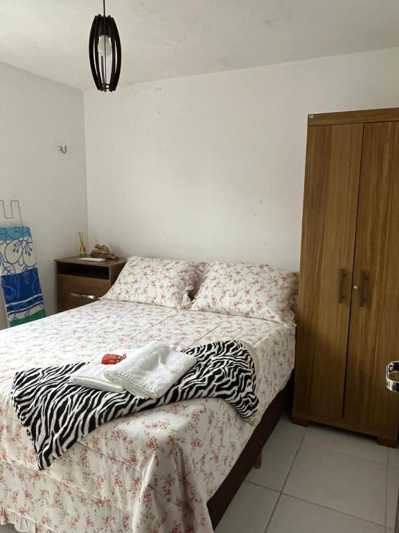 Postel nebo postele na pokoji v ubytování Chalé Acolhedor em Bananeiras