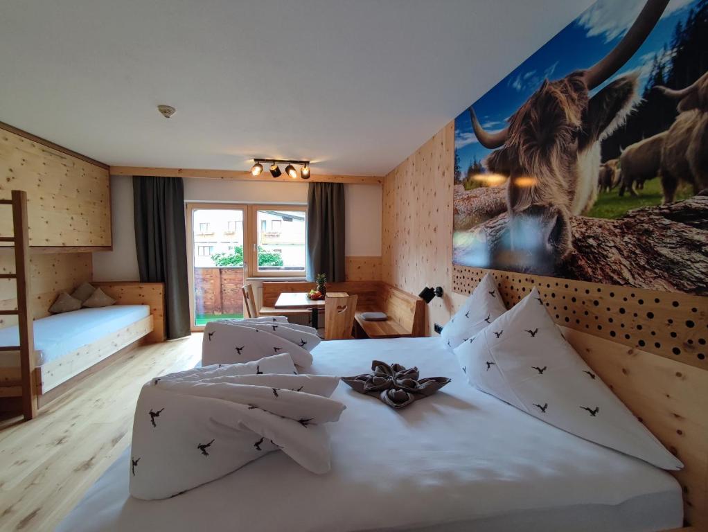 Posteľ alebo postele v izbe v ubytovaní Apart Hotel Ideal