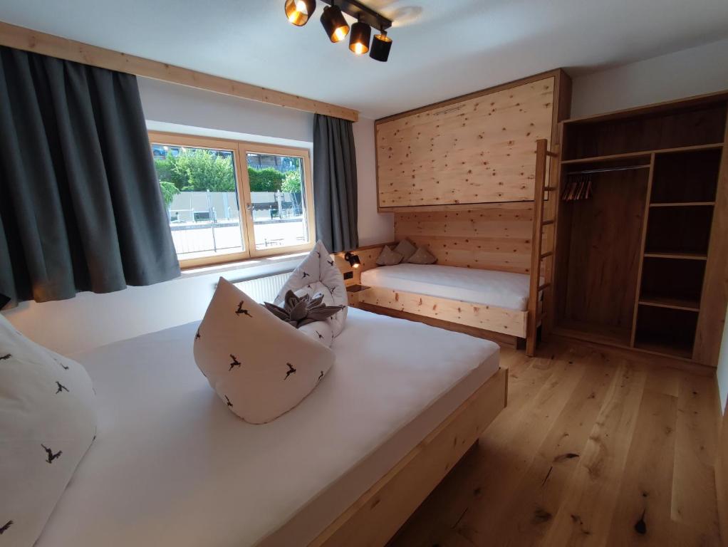 Posteľ alebo postele v izbe v ubytovaní Apart Hotel Ideal