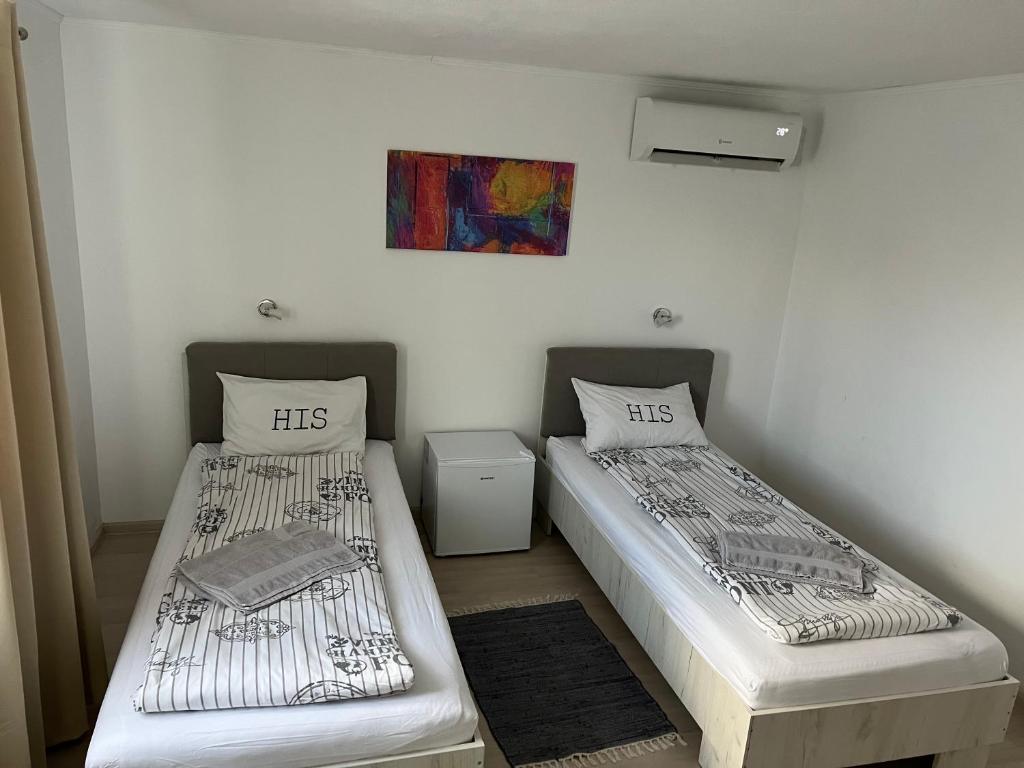Postel nebo postele na pokoji v ubytování Four Rooms