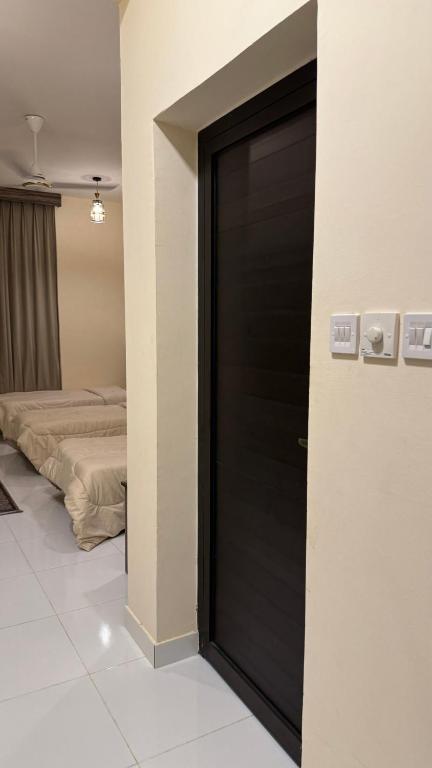 Ένα ή περισσότερα κρεβάτια σε δωμάτιο στο Bait Al Hakem Guest Rooms