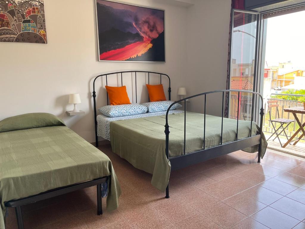 Postel nebo postele na pokoji v ubytování Nemi rooms