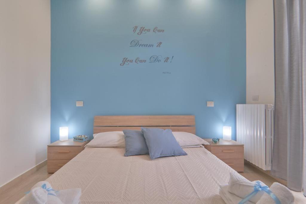 Postel nebo postele na pokoji v ubytování Lecce d'amare - 3 rooms