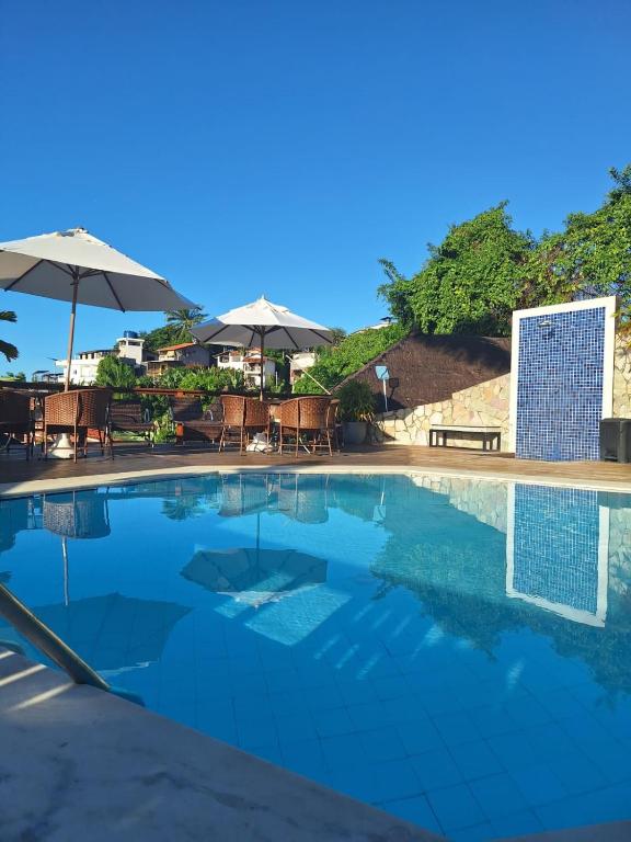Bazén v ubytování Hotel Morro De São Paulo nebo v jeho okolí