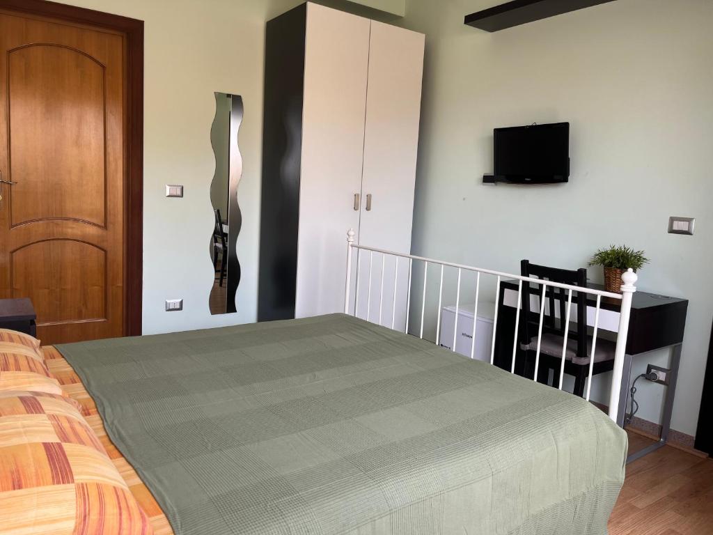 Postel nebo postele na pokoji v ubytování Nemi rooms