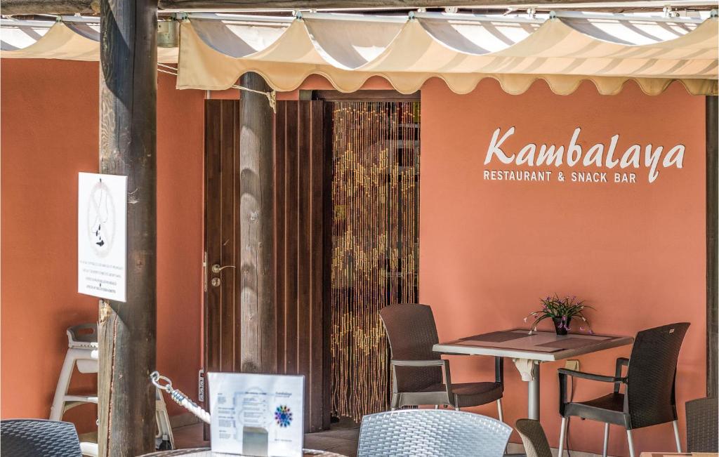 A restaurant or other place to eat at Beautiful Apartment In Estepona