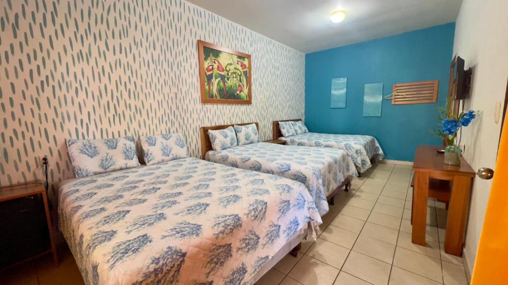 Postel nebo postele na pokoji v ubytování Hotel Viña del Mar Omoa