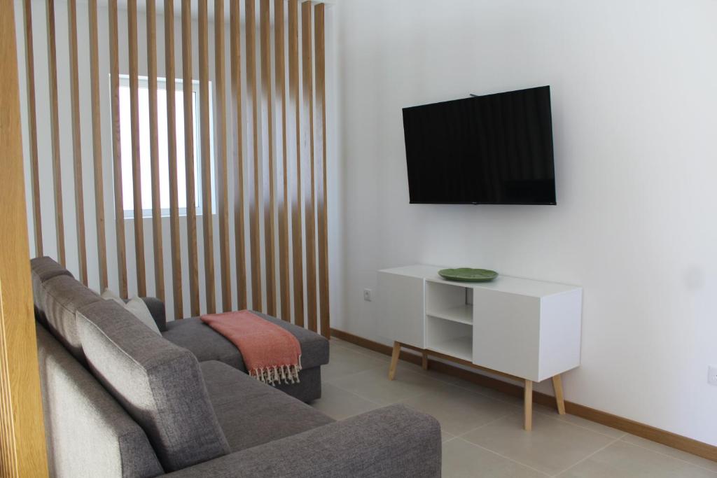 TV a/nebo společenská místnost v ubytování CASA DAS QUINTÃES