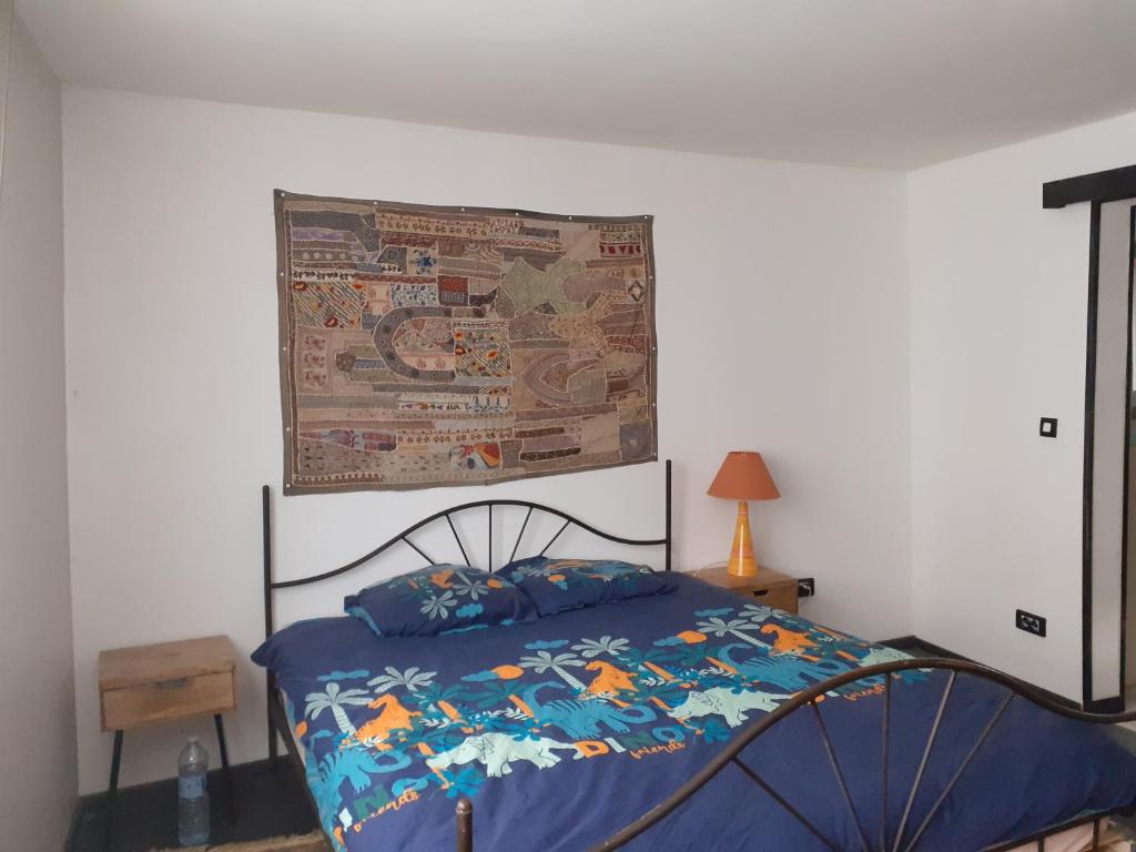 Ένα ή περισσότερα κρεβάτια σε δωμάτιο στο Maison Rosendalienne