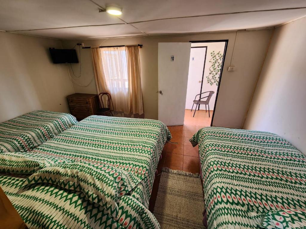 Postel nebo postele na pokoji v ubytování HOSTAL SOL ATACAMA -CALDERA