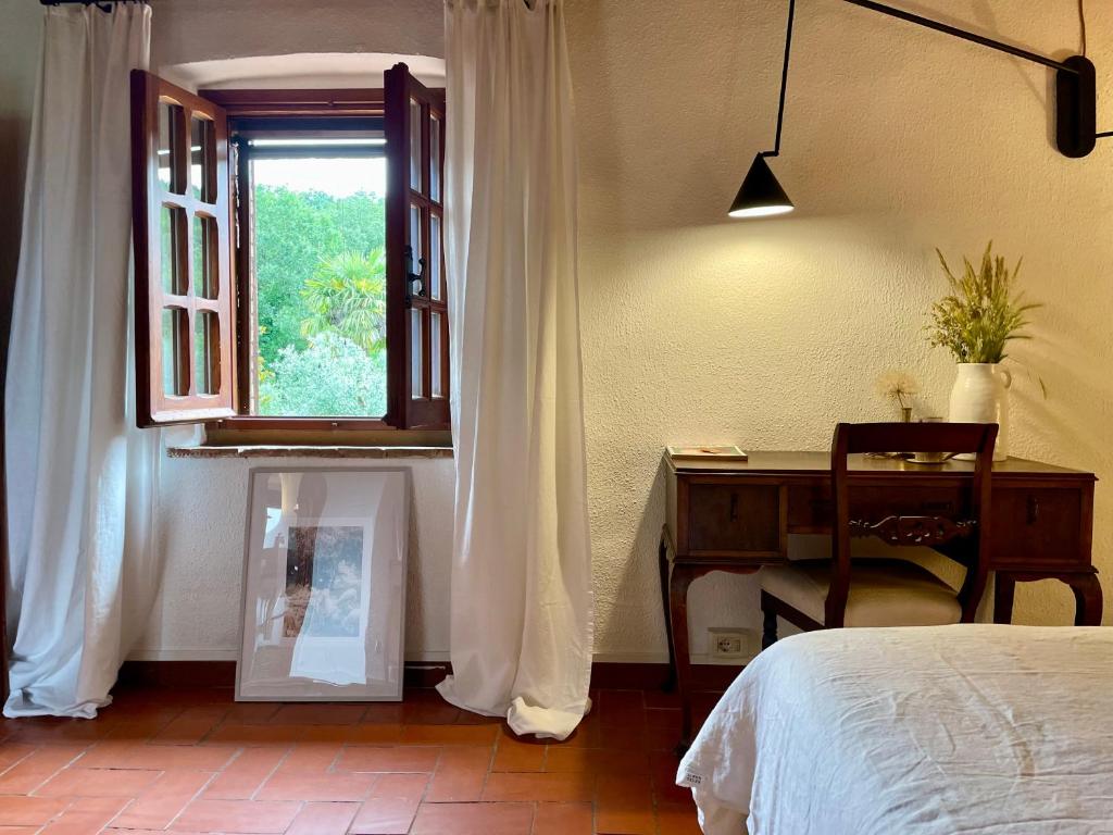 Postel nebo postele na pokoji v ubytování La Melea - vegan Bed and Breakfast