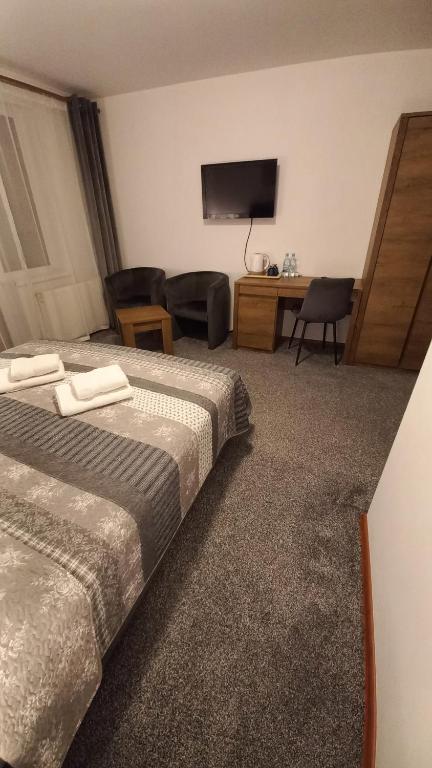 Postel nebo postele na pokoji v ubytování Akwen