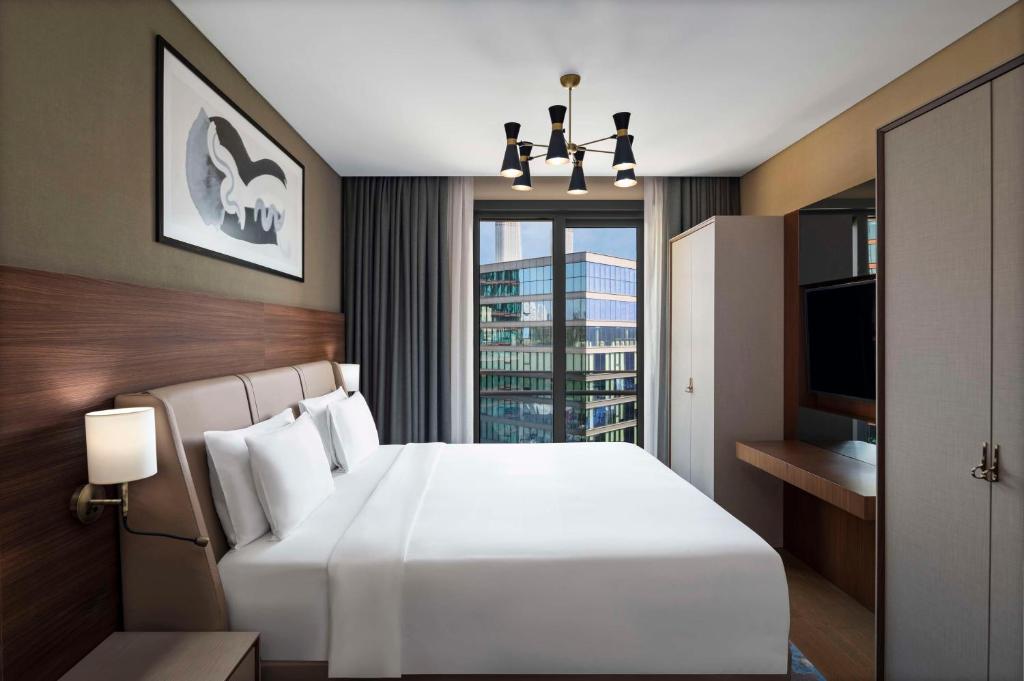 Postel nebo postele na pokoji v ubytování Radisson Residences Vadistanbul