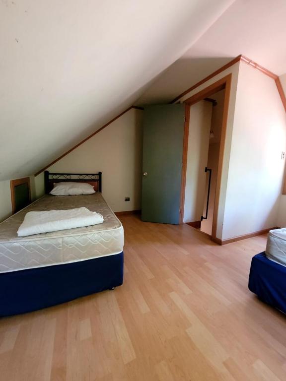 Postel nebo postele na pokoji v ubytování Cabañas La Leona