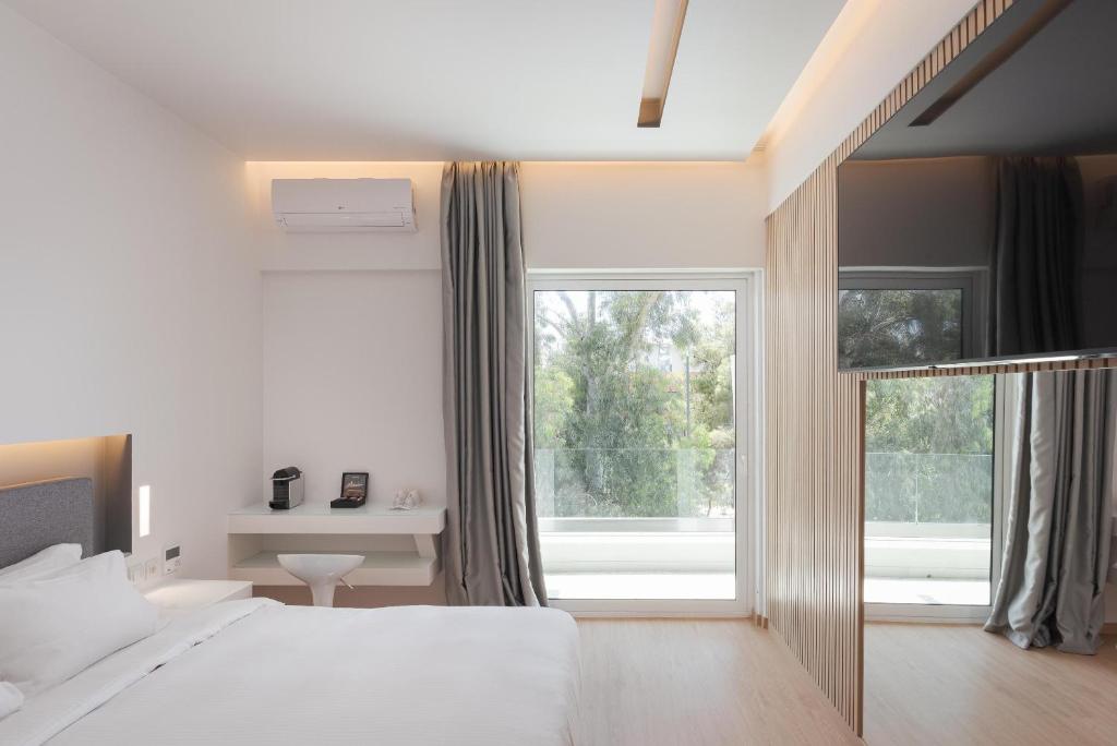 Posteľ alebo postele v izbe v ubytovaní Mirada Hotel