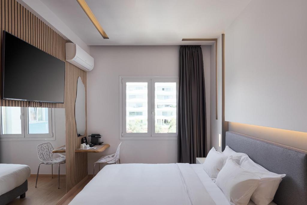 Posteľ alebo postele v izbe v ubytovaní Mirada Hotel