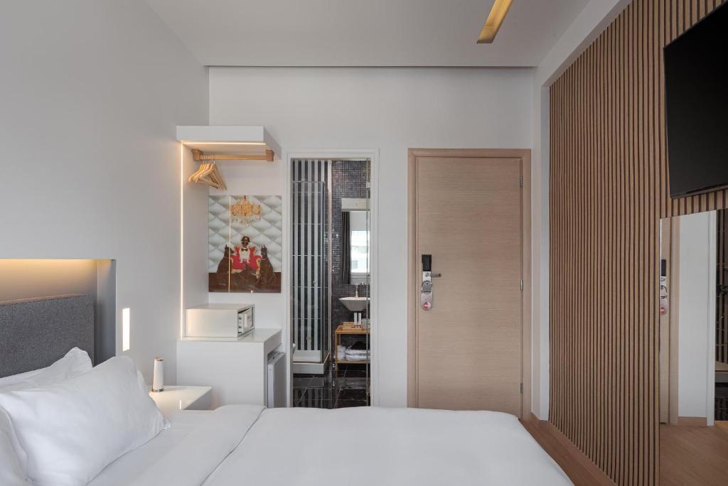 Posteľ alebo postele v izbe v ubytovaní Mirada Hotel