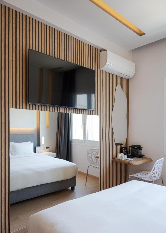 Posteľ alebo postele v izbe v ubytovaní Mirada Hotel