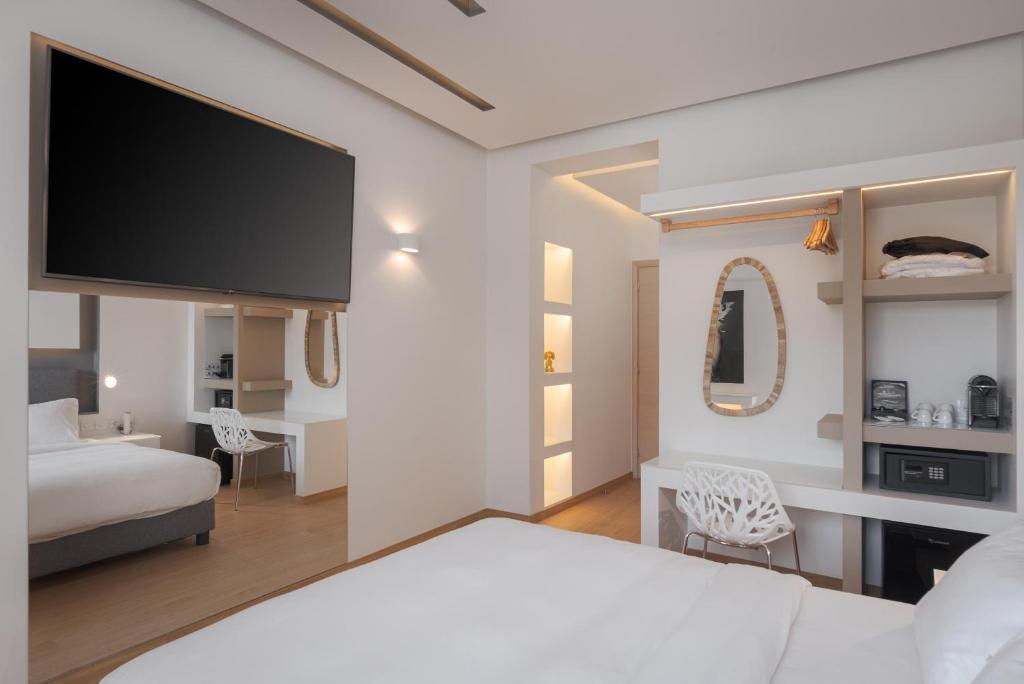 Posteľ alebo postele v izbe v ubytovaní Mirada Hotel