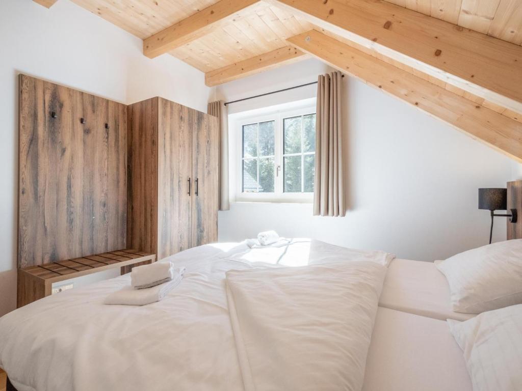 Postel nebo postele na pokoji v ubytování Riesner Alm 35