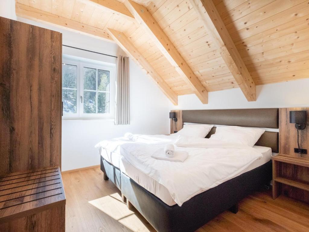 Postel nebo postele na pokoji v ubytování Riesner Alm 35