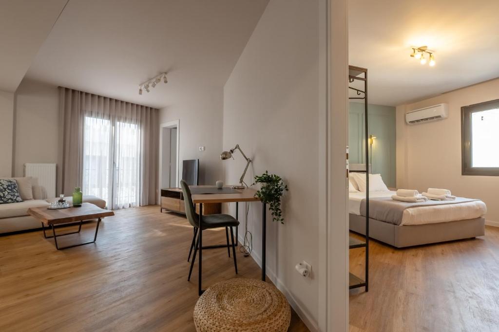 Posteľ alebo postele v izbe v ubytovaní Live Life Plaka Apartment