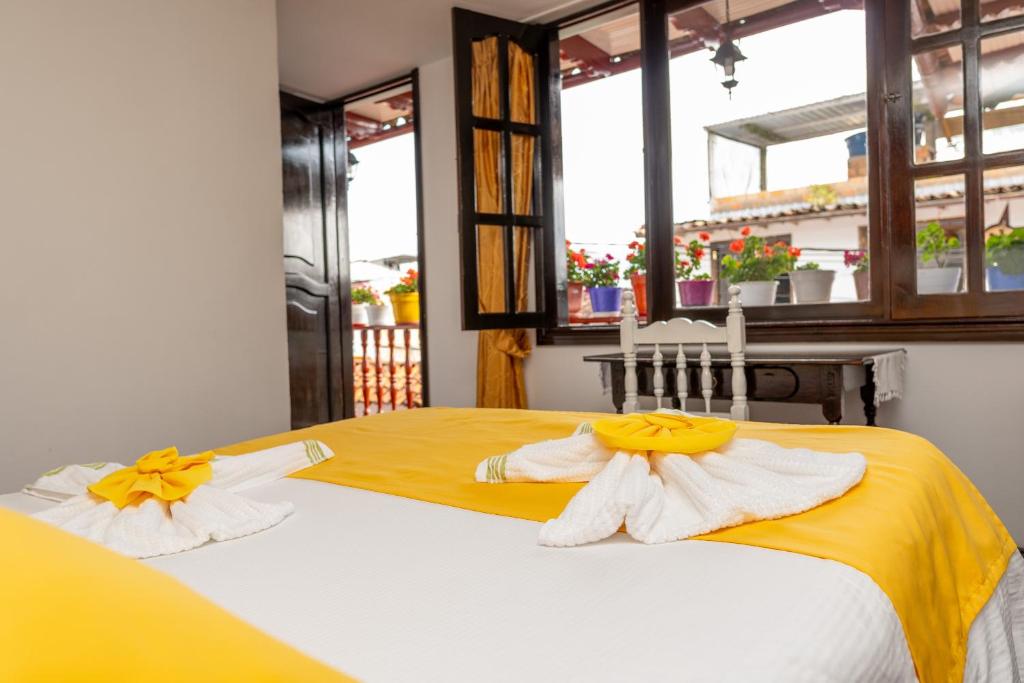 Postel nebo postele na pokoji v ubytování HOTEL LA CASONA SAN AGUSTIn