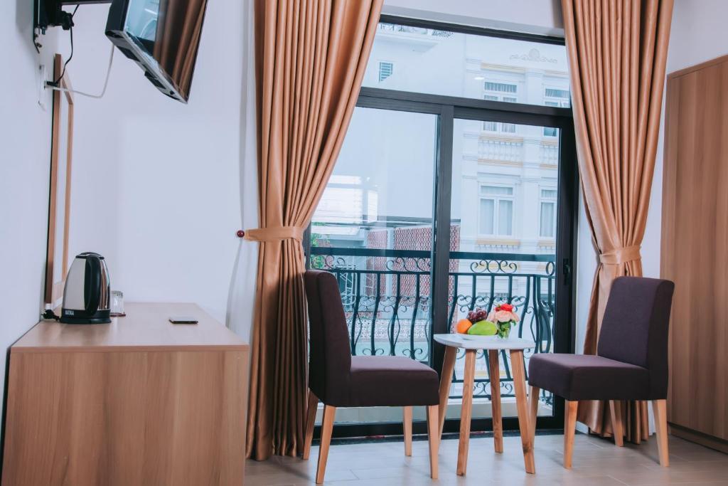 TV a/nebo společenská místnost v ubytování An Dương Hotel & Apartment