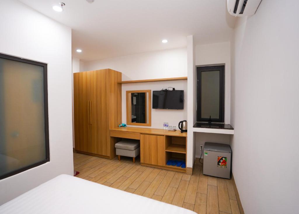 Kuchyň nebo kuchyňský kout v ubytování An Dương Hotel & Apartment