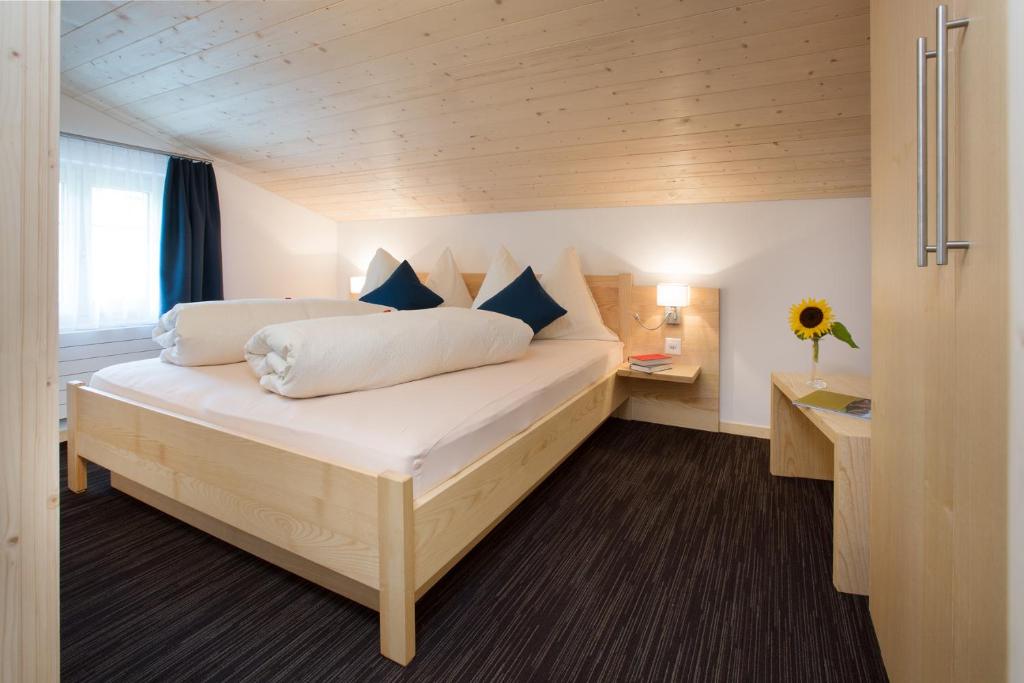 Postel nebo postele na pokoji v ubytování Boutique-Hotel Vincenz