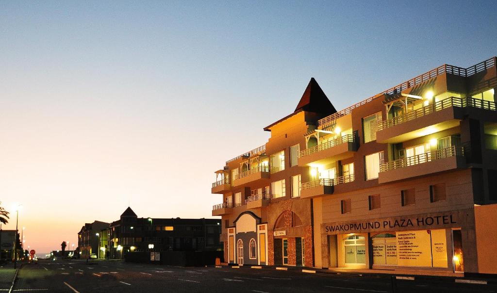 a building with lights on the side of a street at Swakopmund Plaza Hotel in Swakopmund