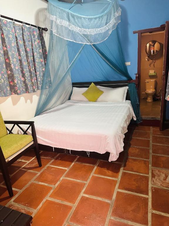 Postel nebo postele na pokoji v ubytování XQ B&B