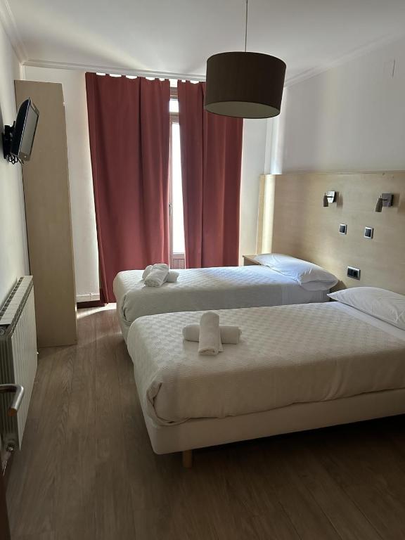 Postel nebo postele na pokoji v ubytování Casa OTANO