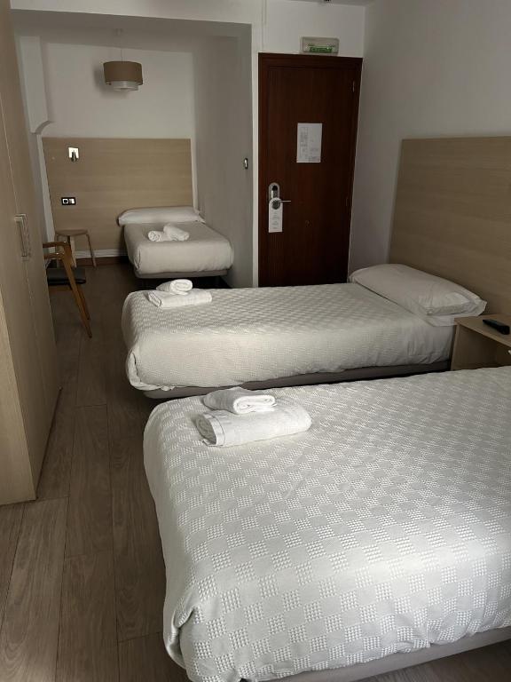 Postel nebo postele na pokoji v ubytování Casa OTANO