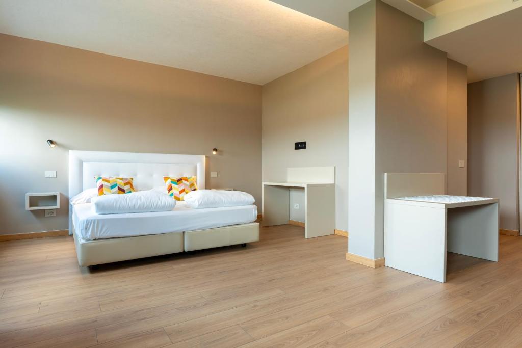 Voodi või voodid majutusasutuse Hotel Saccardi & Spa - Adults Only toas