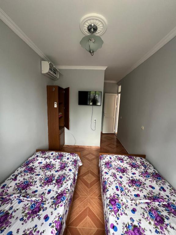 Postel nebo postele na pokoji v ubytování Saba Guest House